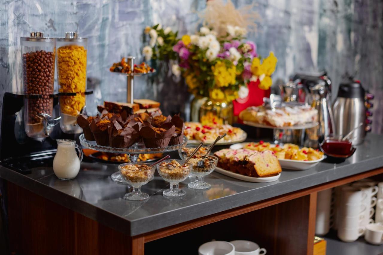 Tapis Rouge Design Boutique Hotel Batumi Exterior photo A buffet of desserts
