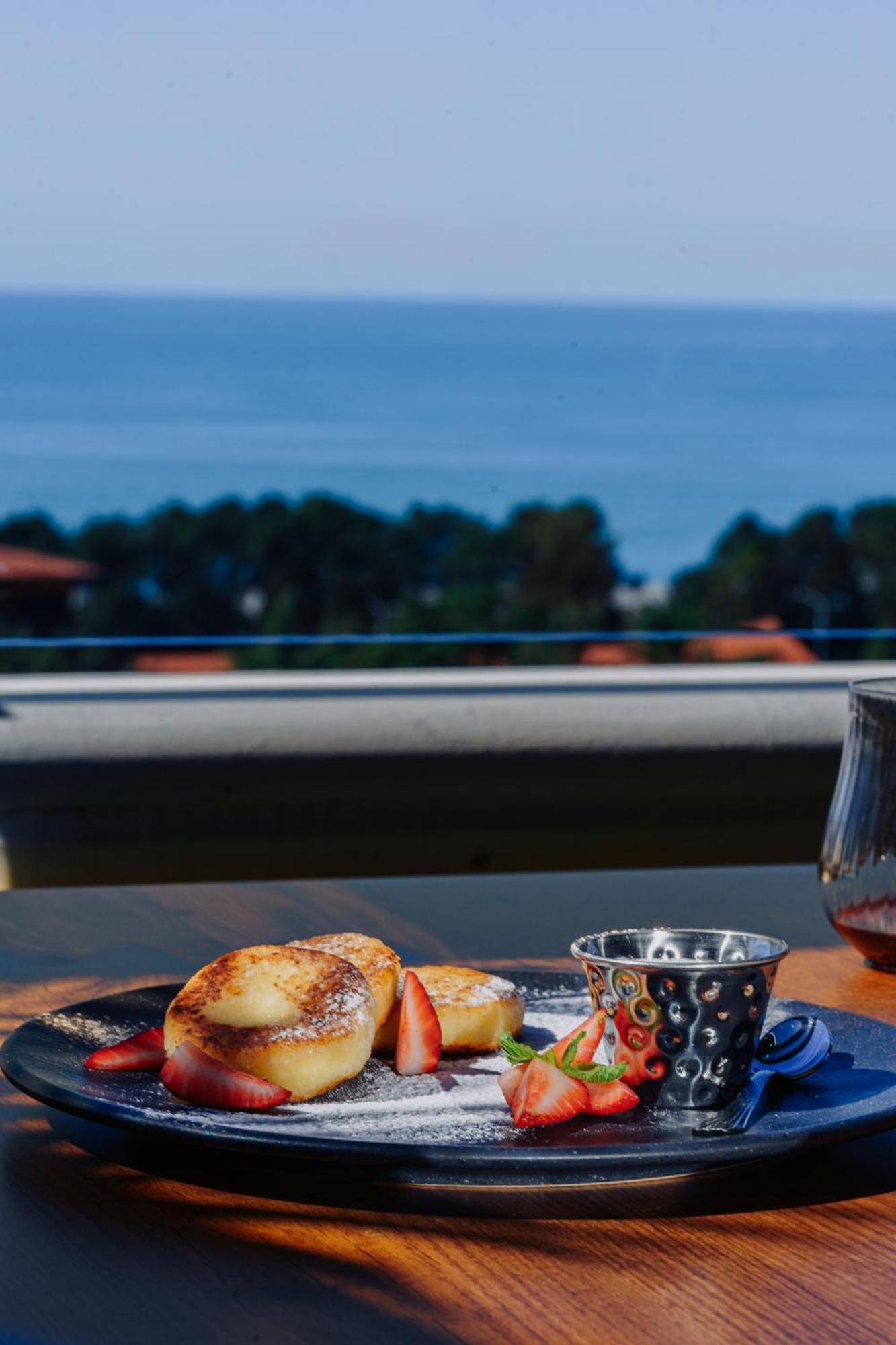 Tapis Rouge Design Boutique Hotel Batumi Exterior photo A view of the track from the restaurant